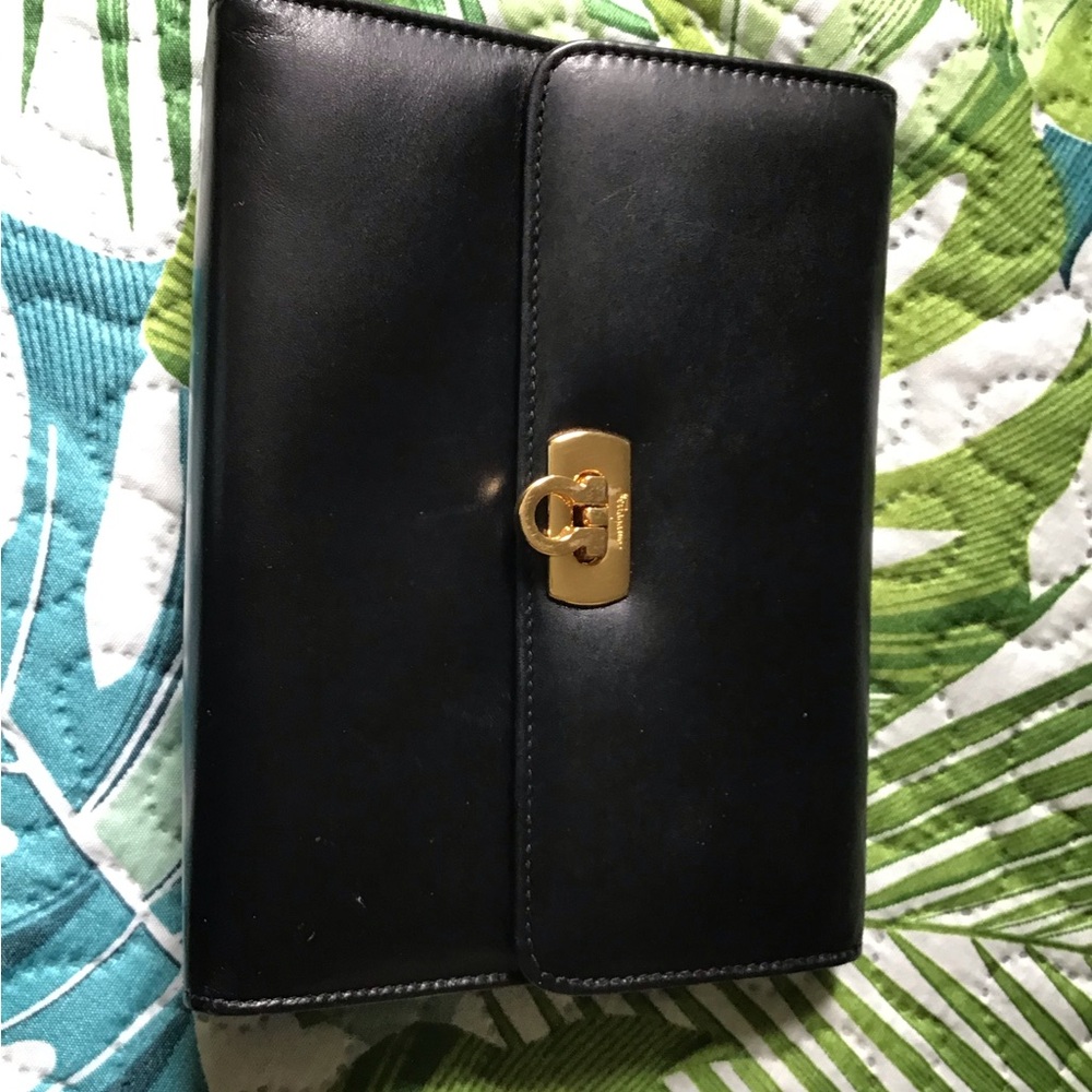 Salvatore Ferragamo Black and Gold Clutch